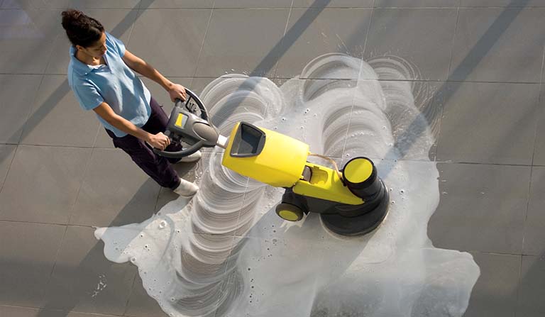 Commercially cleaning VCT tile with a propane buffer